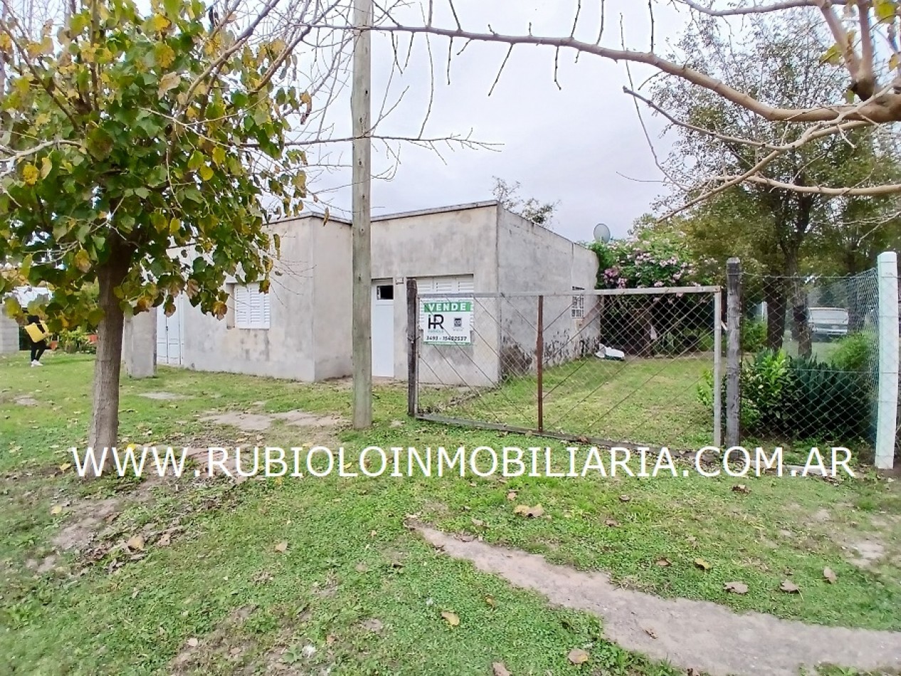 CORONEL FRAGA - SF - VIVIENDA 2 DORMITORIOS - GARAGE - AMPLIO LOTE CON DEPOSITO / TALLER