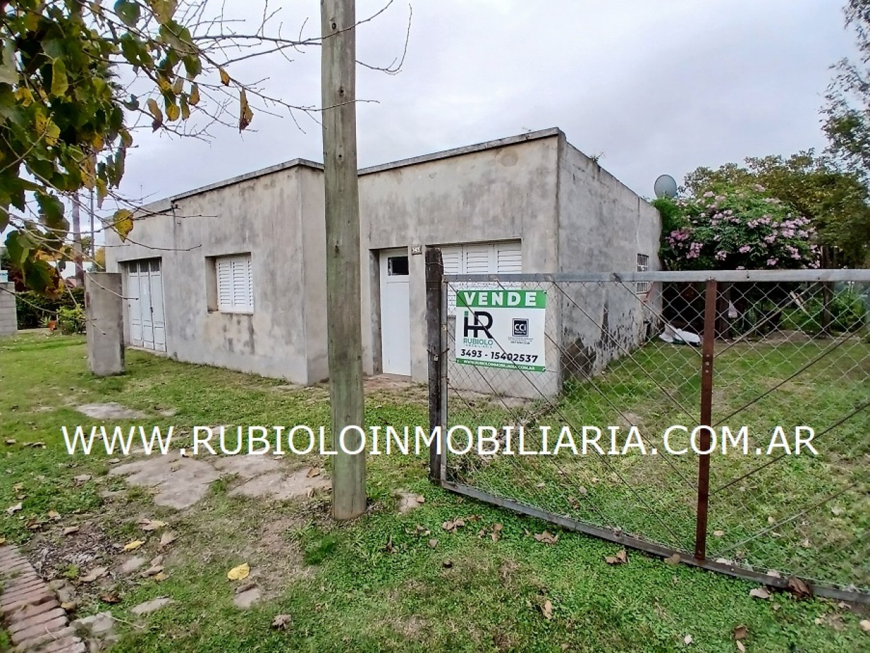 CORONEL FRAGA - SF - VIVIENDA 2 DORMITORIOS - GARAGE - AMPLIO LOTE CON DEPOSITO / TALLER